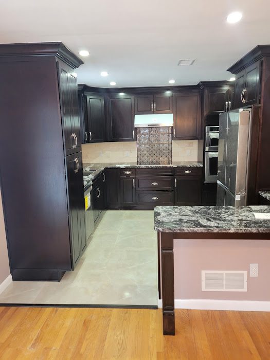 Espresso kitchen with granite peninsula